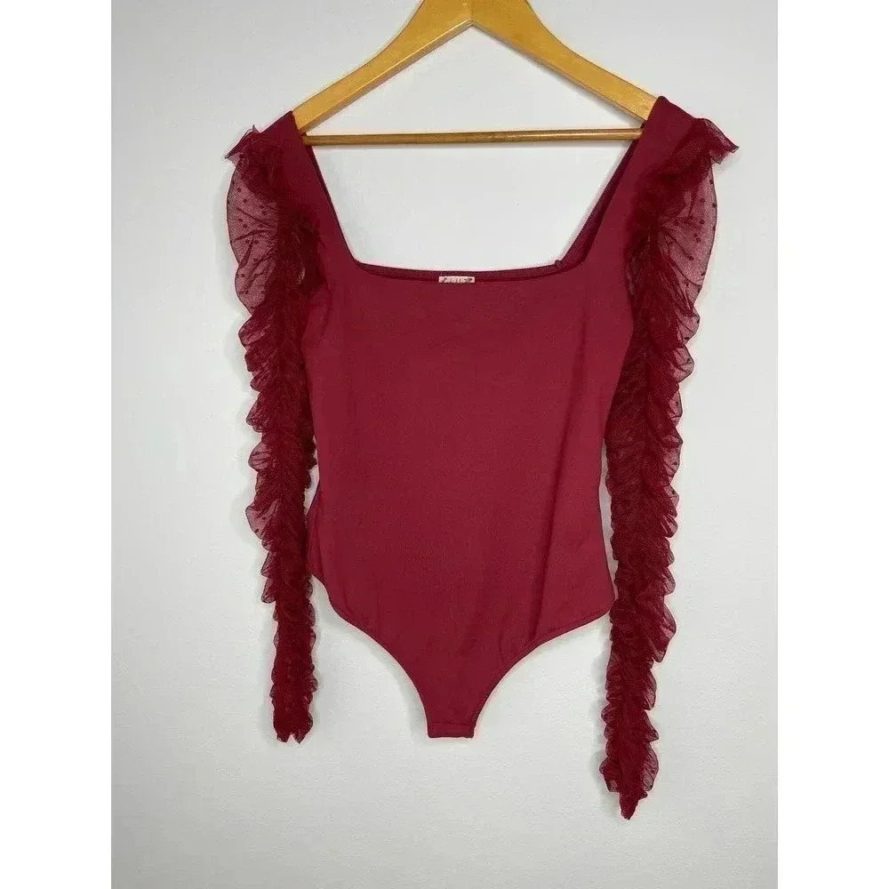 Intimately by Free People Must be love bodysuit wine size S